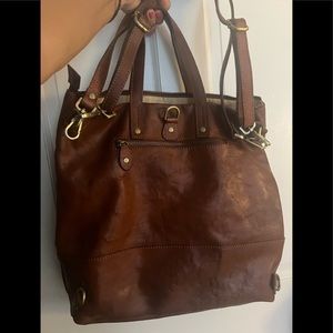 Brown leather backpack or can be a shoulder bag. Genuine leather.
